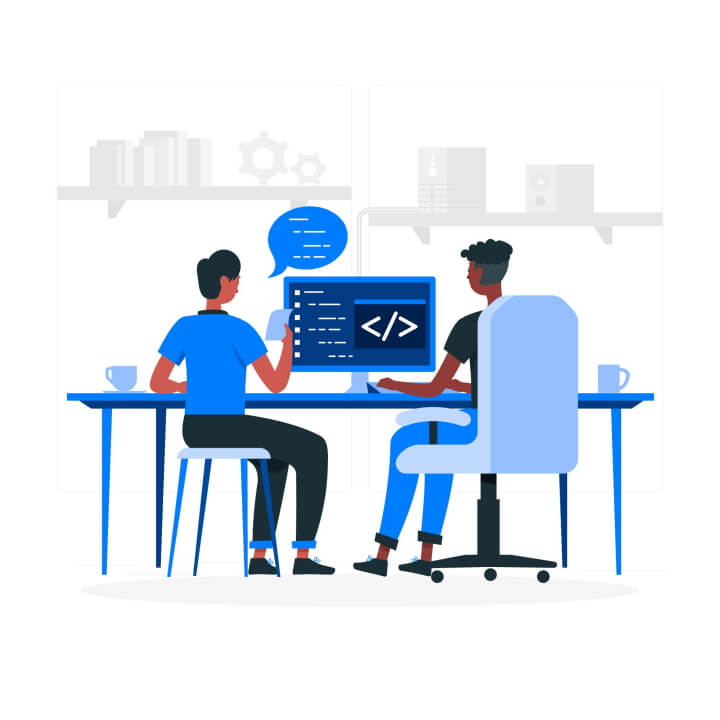 Abstract image of two men working on one computer.