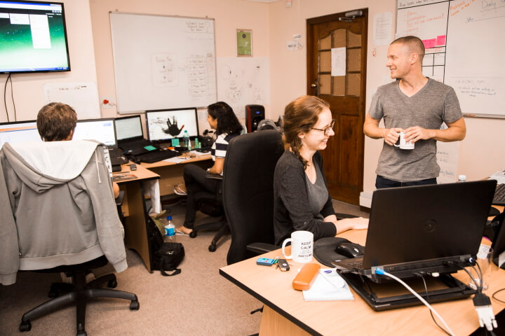 A picture of happy KRS staff in the office