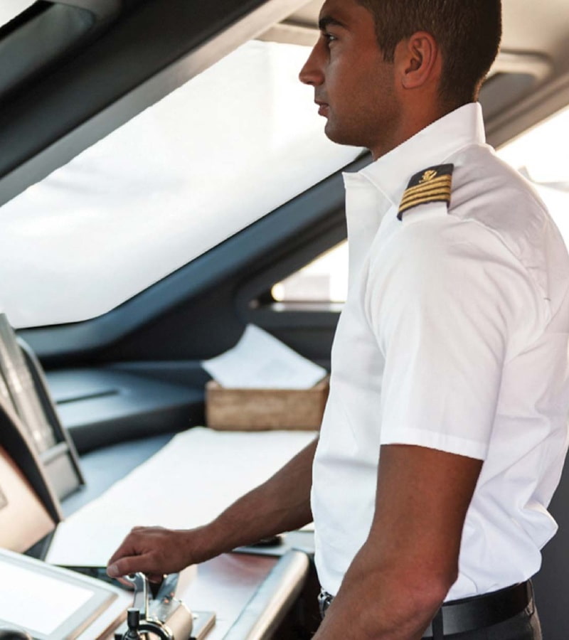 Ship captain in the control room using Smart Ship Management software by KRS