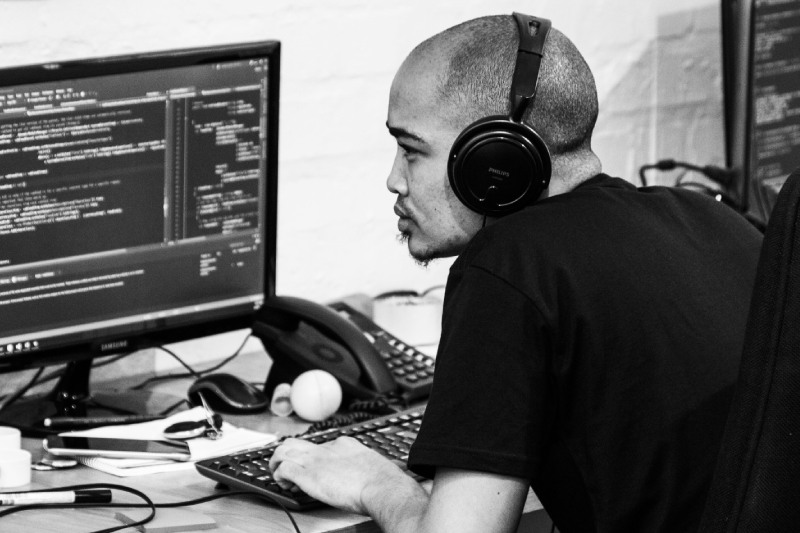 KRS - Khanyisa Real Systems - developer working at his desk