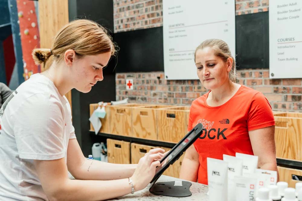 KRS Khanyisa Real-Systems Itensity Two women at gym check in